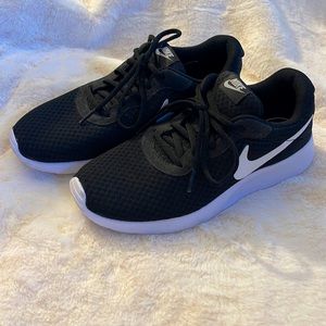 Practically brand new womens Nike sneakers. Warn once, and in good condition